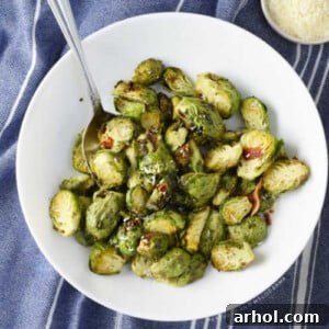 bowl of Brussels sprouts with Parmesan and bacon cooked in the air fryer