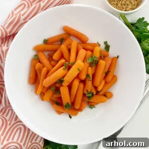 microwave cooked carrots in white bowl