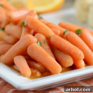 instant pot orange ginger carrots on white platter