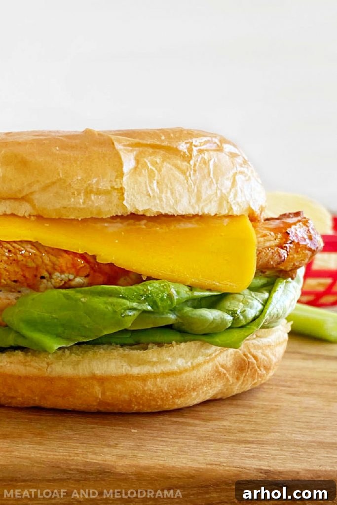 Side view of a delicious Buffalo chicken sandwich on a bun