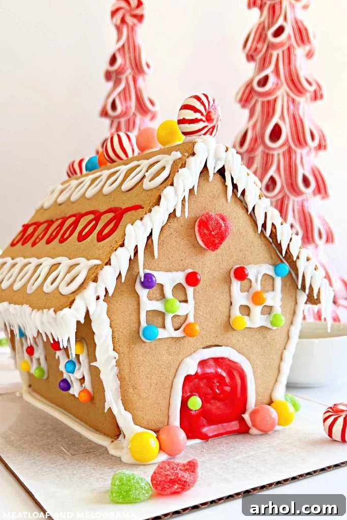 Finished decorated gingerbread house showcasing creative candy placements