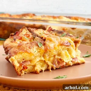 sliced ham and cheese strata on plate