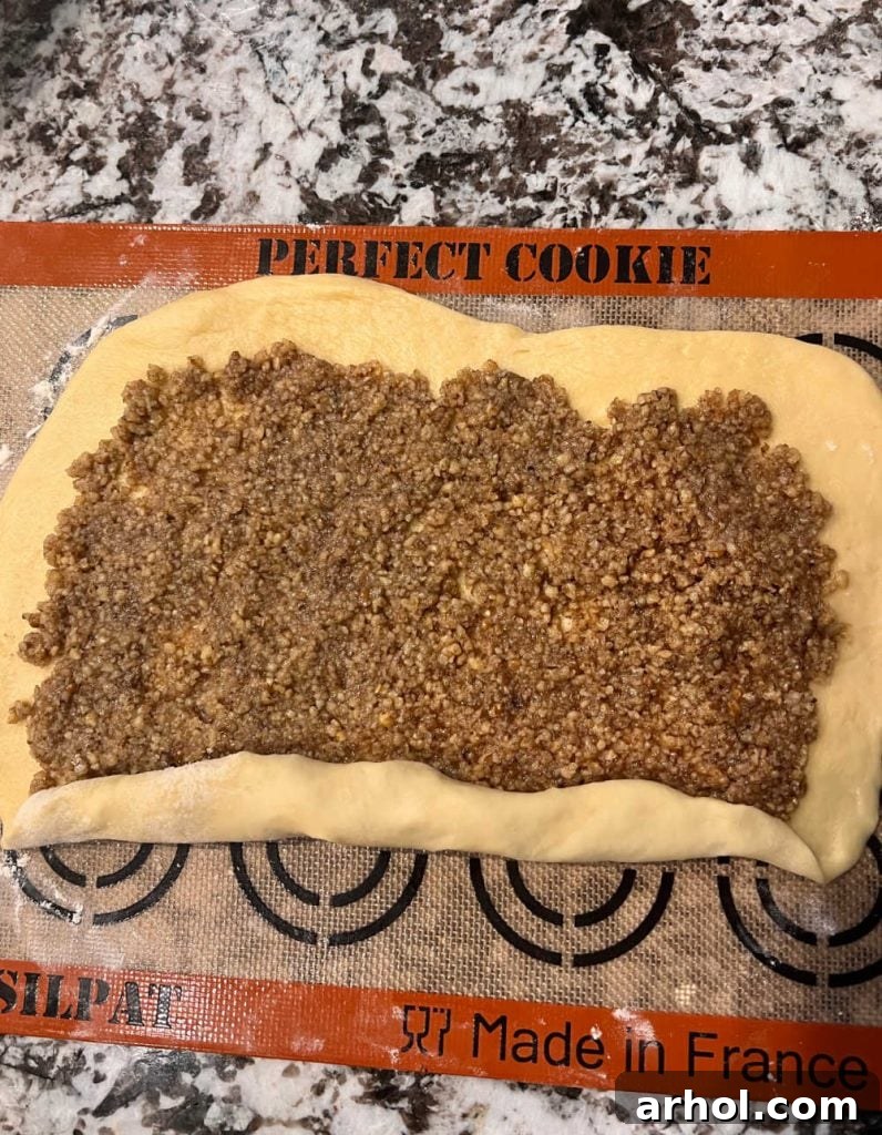 roll dough over nut filling to make nut rolls