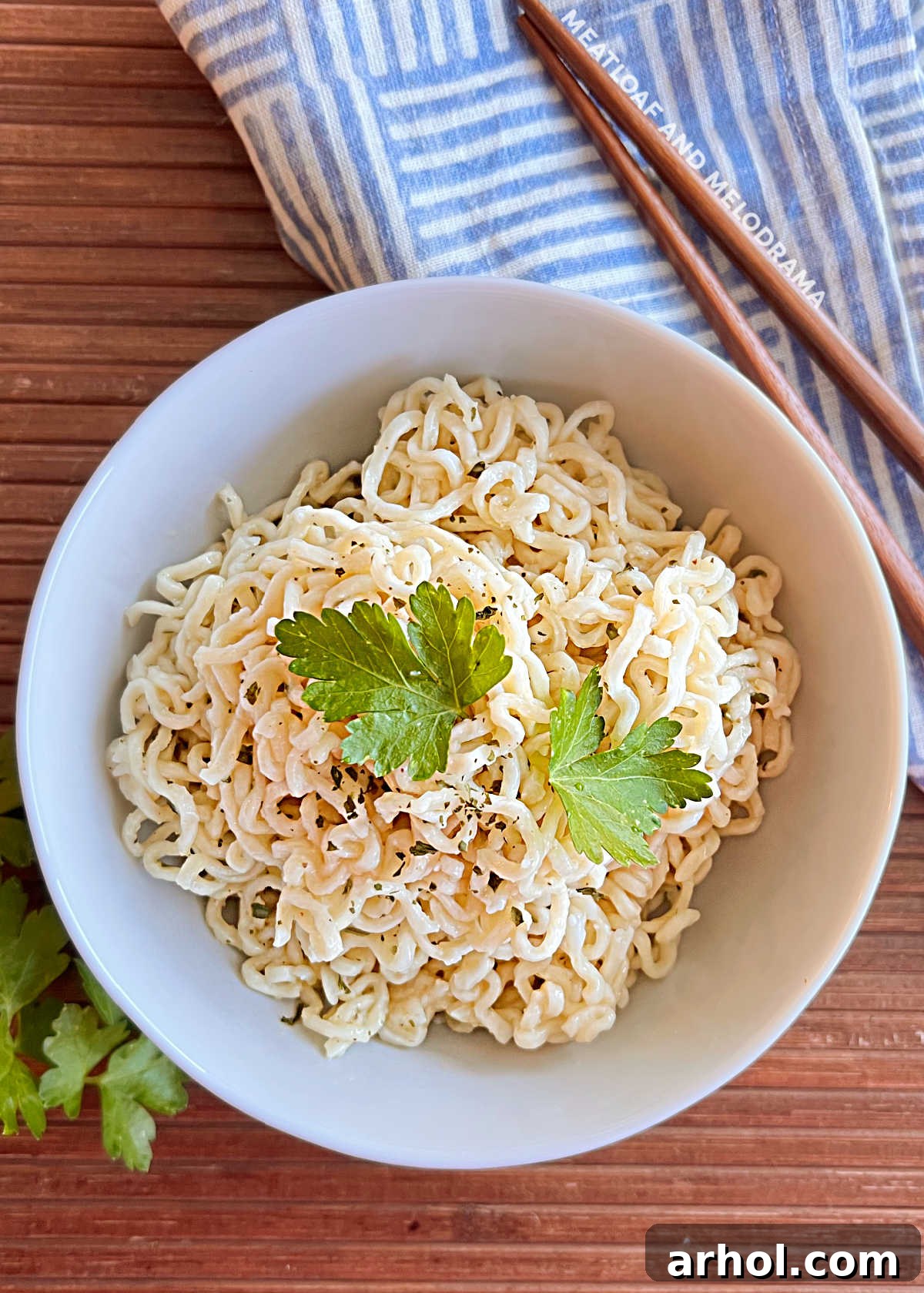 ramen noodles with parsley in a small bowl