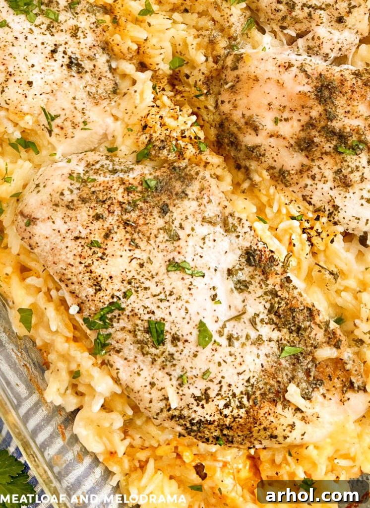 The finished, baked No Peek Chicken and Rice casserole, golden and creamy, still in the dish.