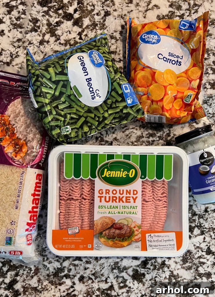 Wholesome Canine Meals Made Simple with Instant Pot 3 ground turkey, rice, green beans, carrots and coconut oil on the counter