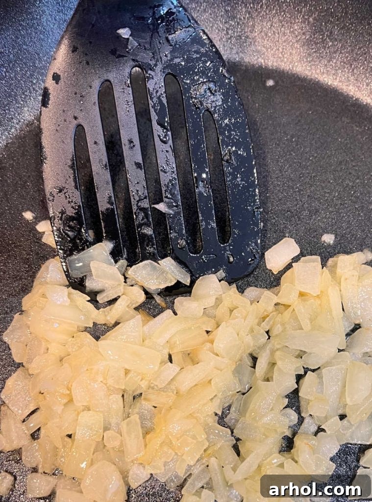 saute onions in butter in skillet