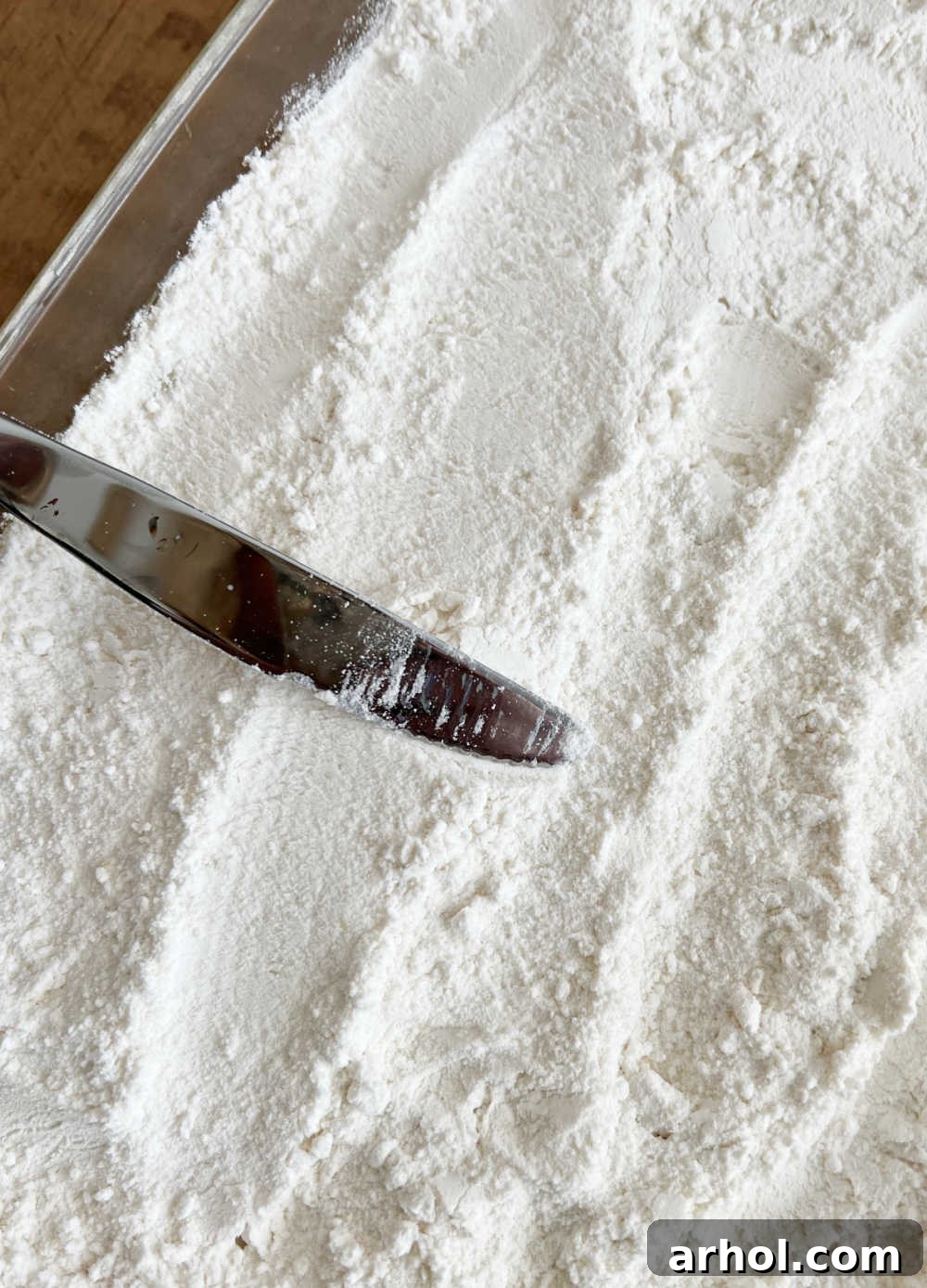 Cake Mix Layer Dry yellow cake mix smoothly spread over the lemon pie filling in a baking dish.