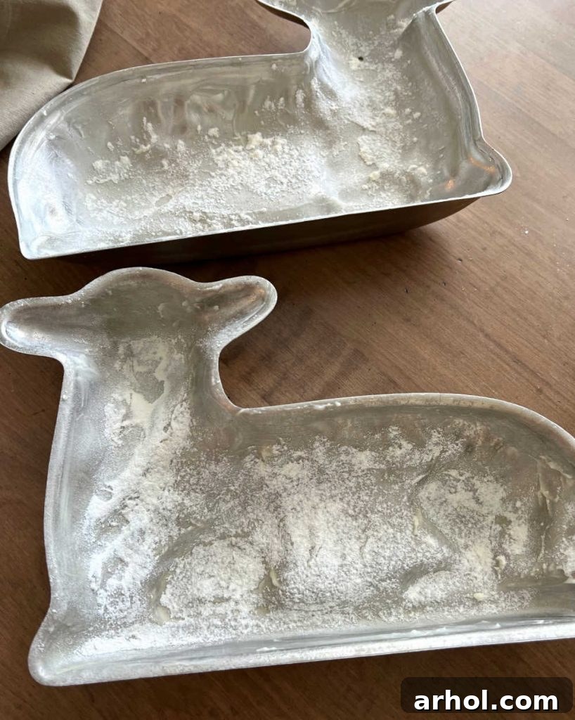 Irresistible Easter Lamb Cake 4 Lamb cake mold meticulously greased and floured on a kitchen counter, ready for the batter