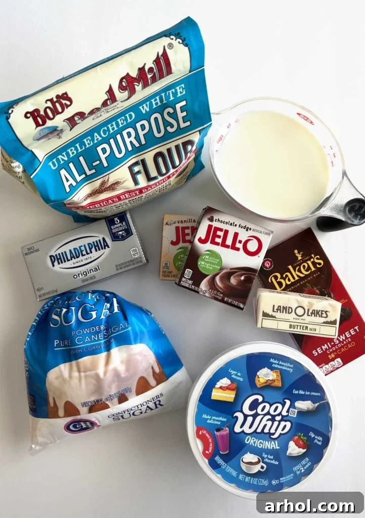 Key ingredients for chocolate delight: cool whip, cream cheese, powdered sugar, instant pudding, flour, butter, milk, and chocolate bar.