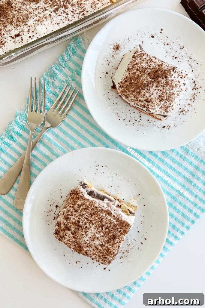 Grandma's layered chocolate pudding dessert, beautifully sliced and served on a table.