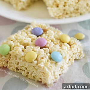 Spring marshmallow rice krispie treats with pastel M&M candies on the table