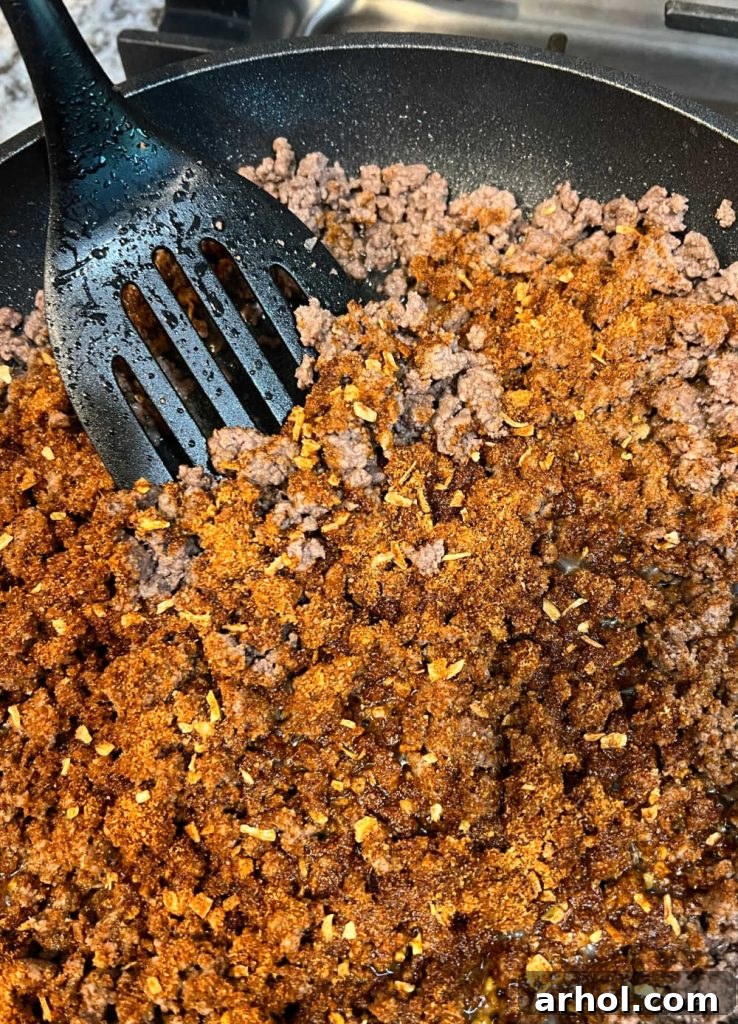 cook taco meat in skillet on stove