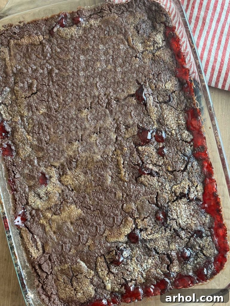 baked chocolate cherry dump cake on table