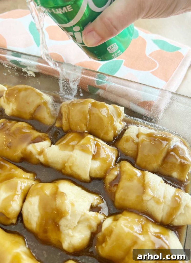 pour can of sprite over peach crescent roll dumplings in pan