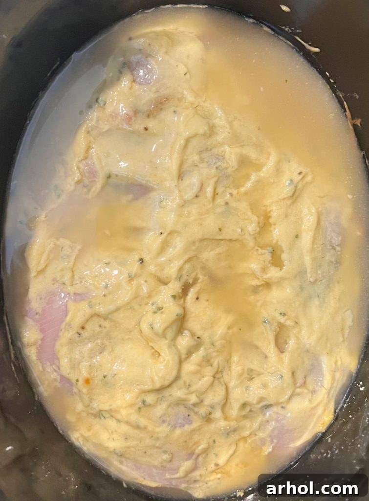 chicken breasts with cream of chicken and broth in slow cooker
