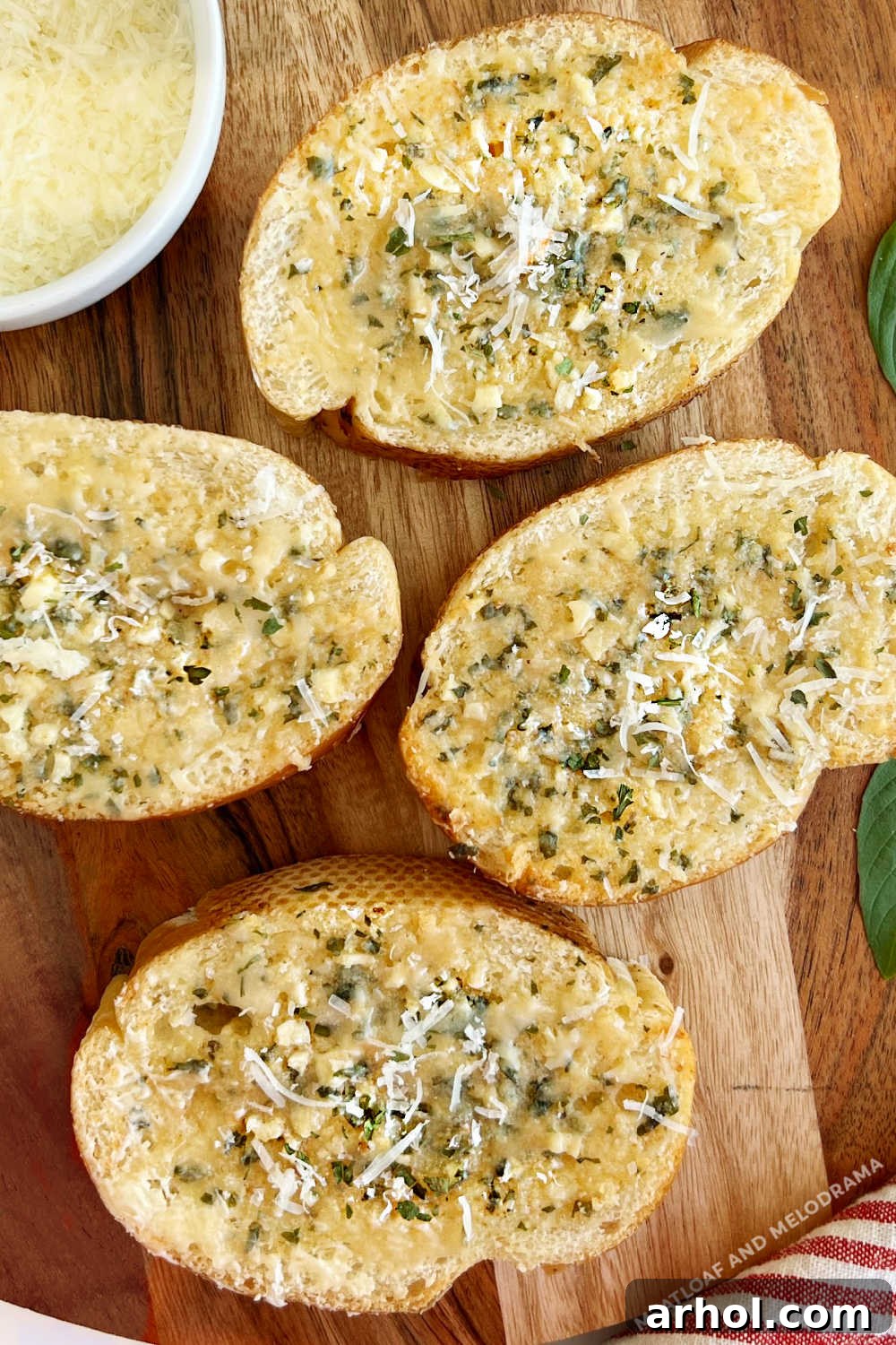 Homemade garlic bread slices with Parmesan cheese and parsley