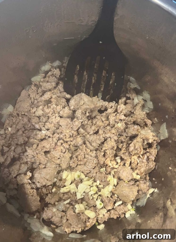 Sautéing Italian sausage with garlic and onions in Instant Pot