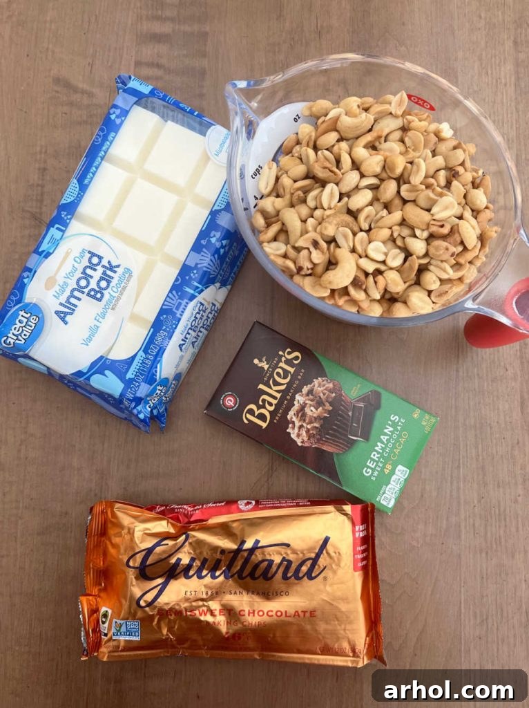 A close-up of the four essential ingredients for crockpot Christmas candy: peanuts, white almond bark, Baker's German Sweet Chocolate, and semi-sweet chocolate chips.