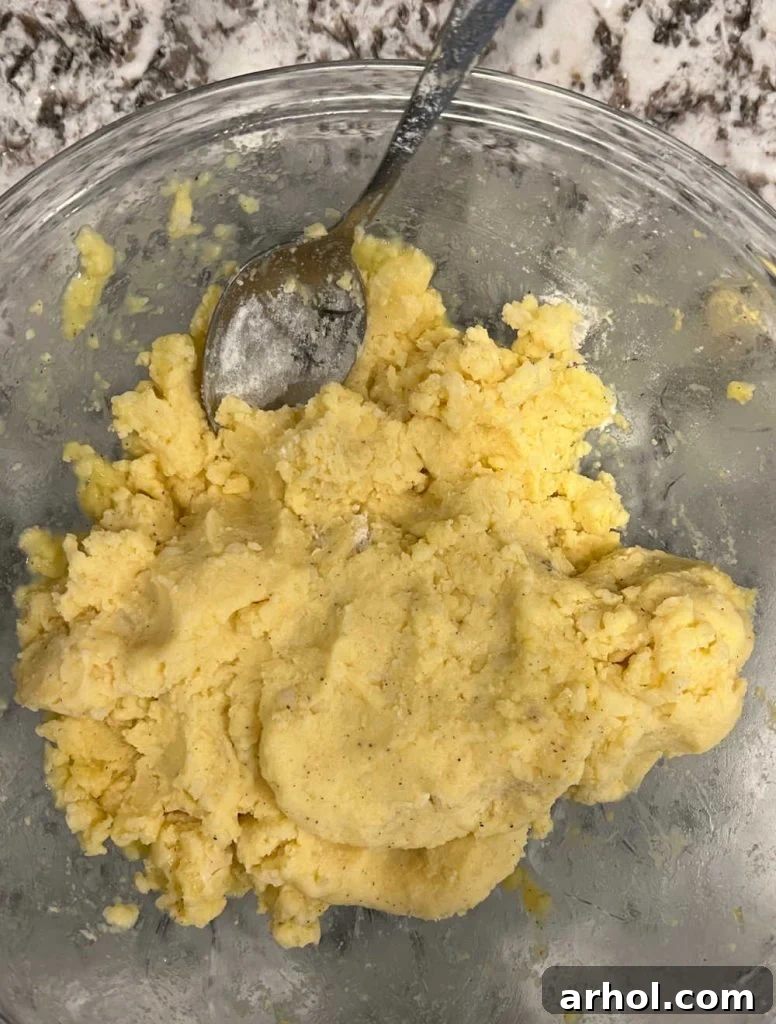 mix flour and egg into mashed potatoes
