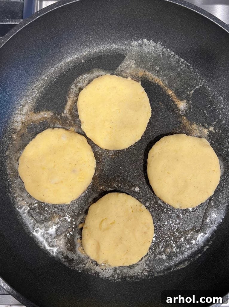 fry potato cakes in frying pan