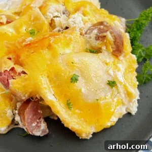 baked pierogi casserole with kielbasa sausage on a plate