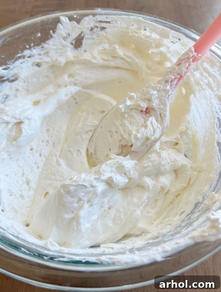 fold Cool Whip into cream cheese mixture