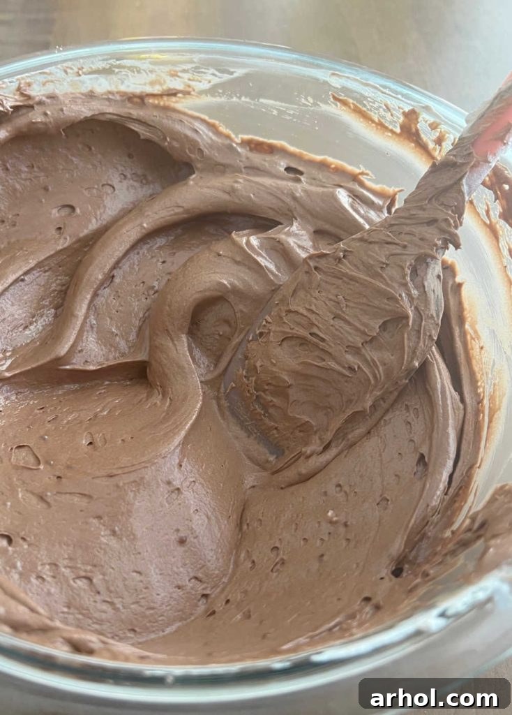 mix cool whip into dip with spatula