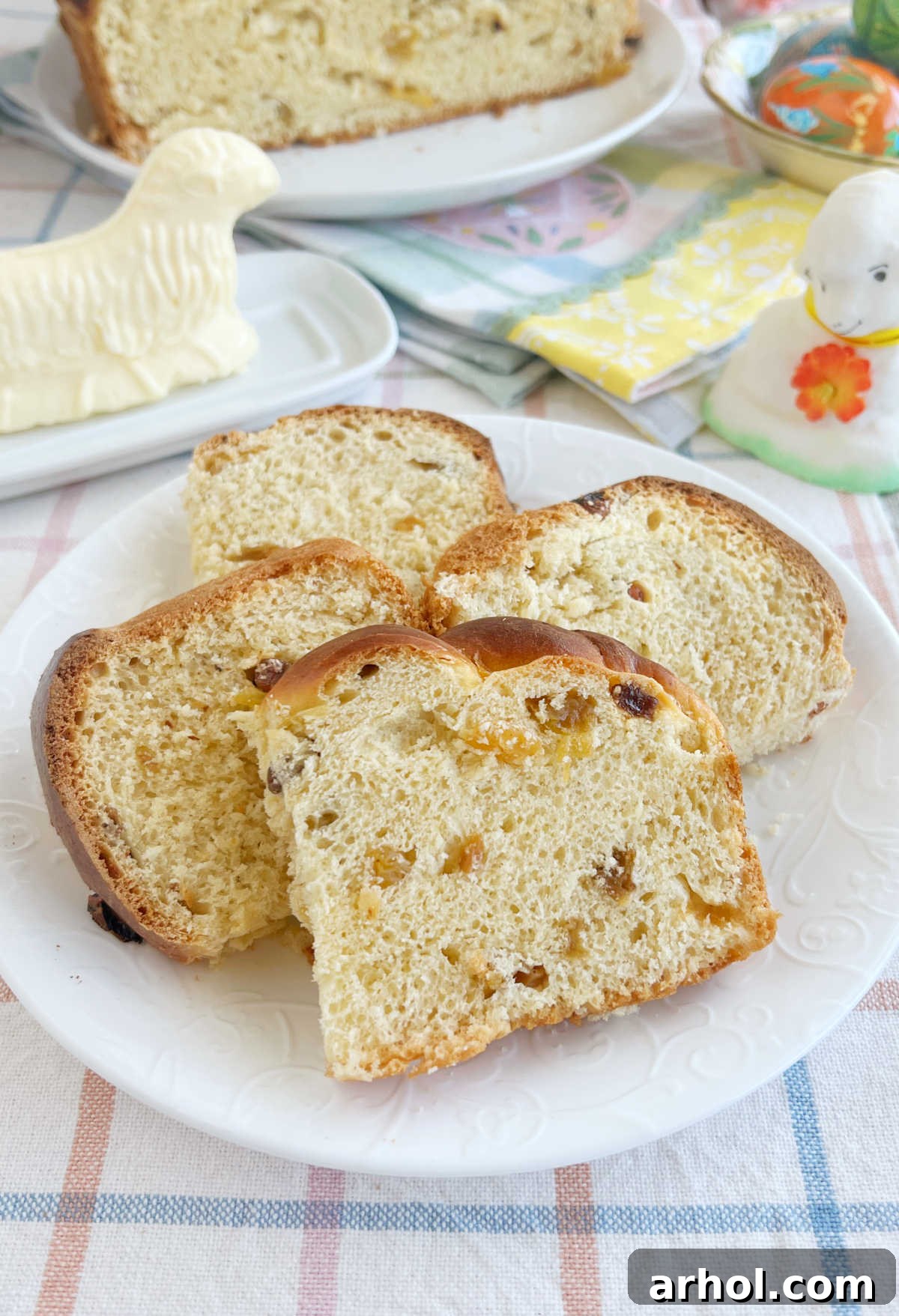 slices of Slovak Easter bread with raisins and butter lamb on table