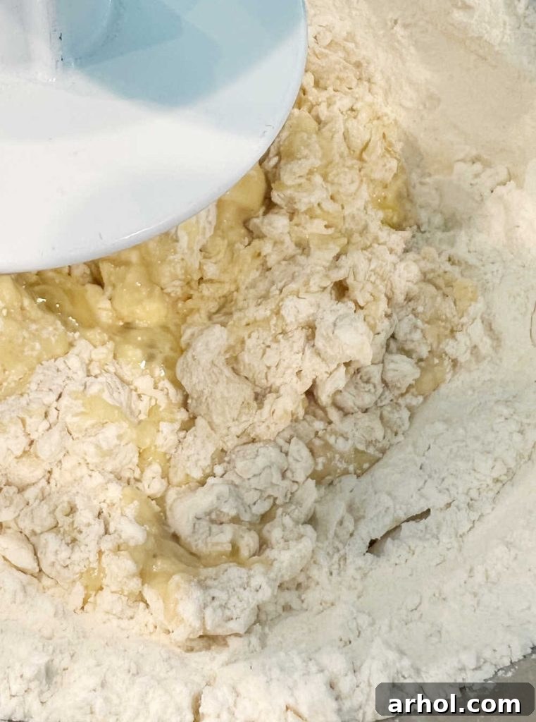 add flour and knead bread in stand mixer