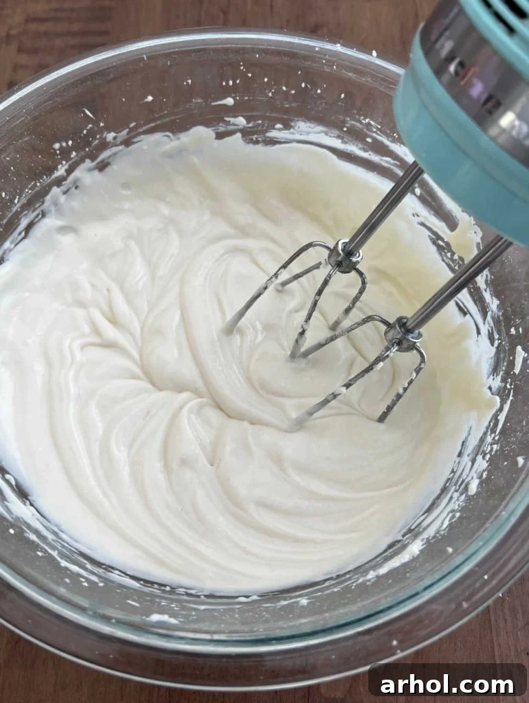 ricotta cheese and cream cheese in mixing bowl
