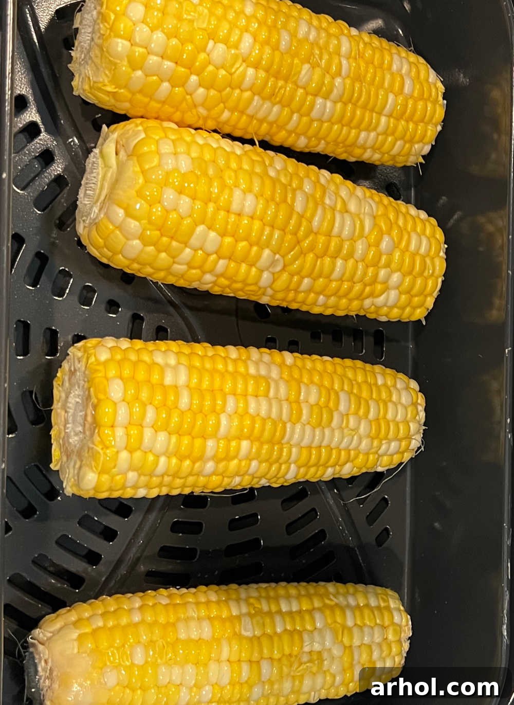 cook fresh ears of corn in air fryer basket.