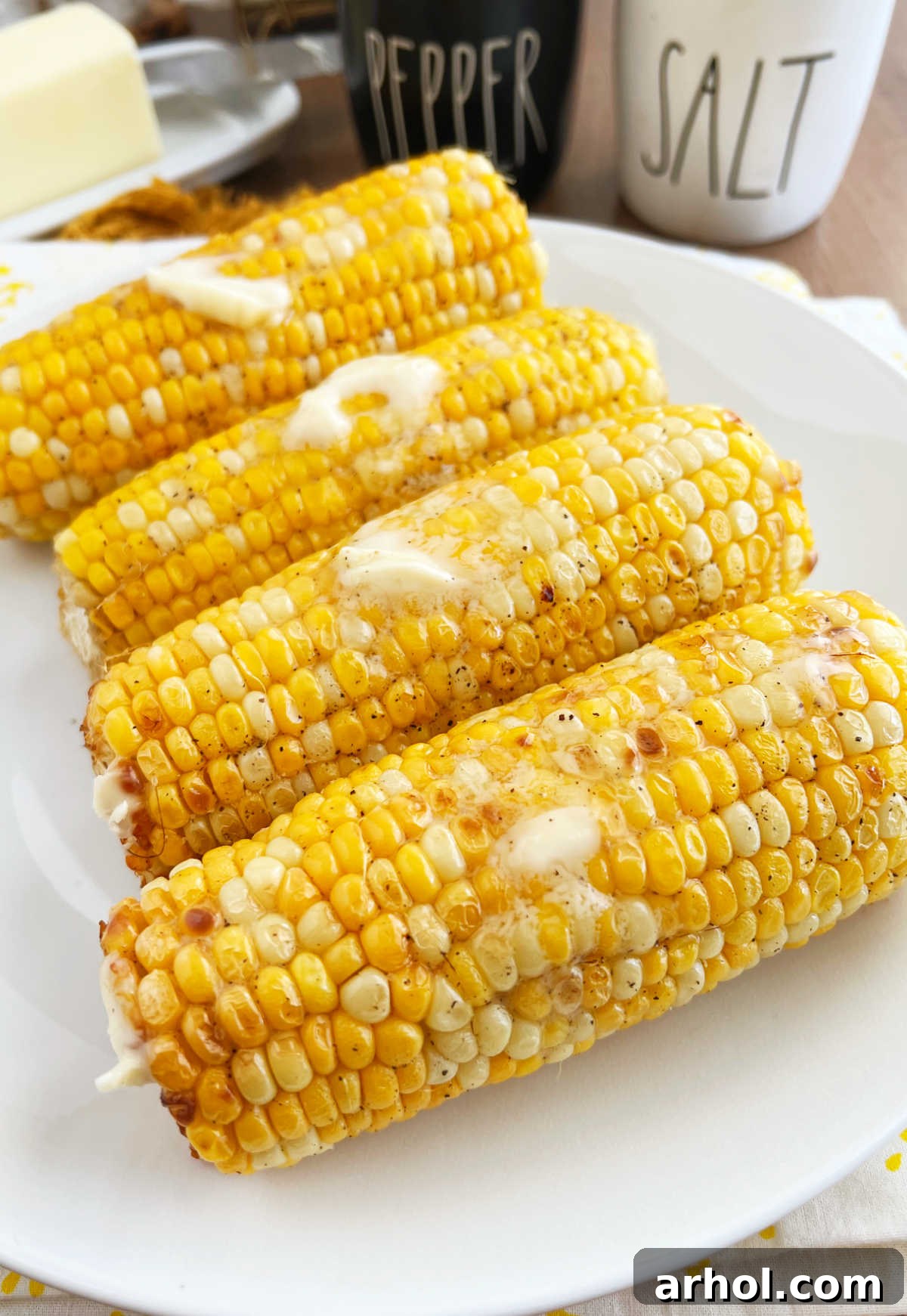 buttered air fried corn on platter.