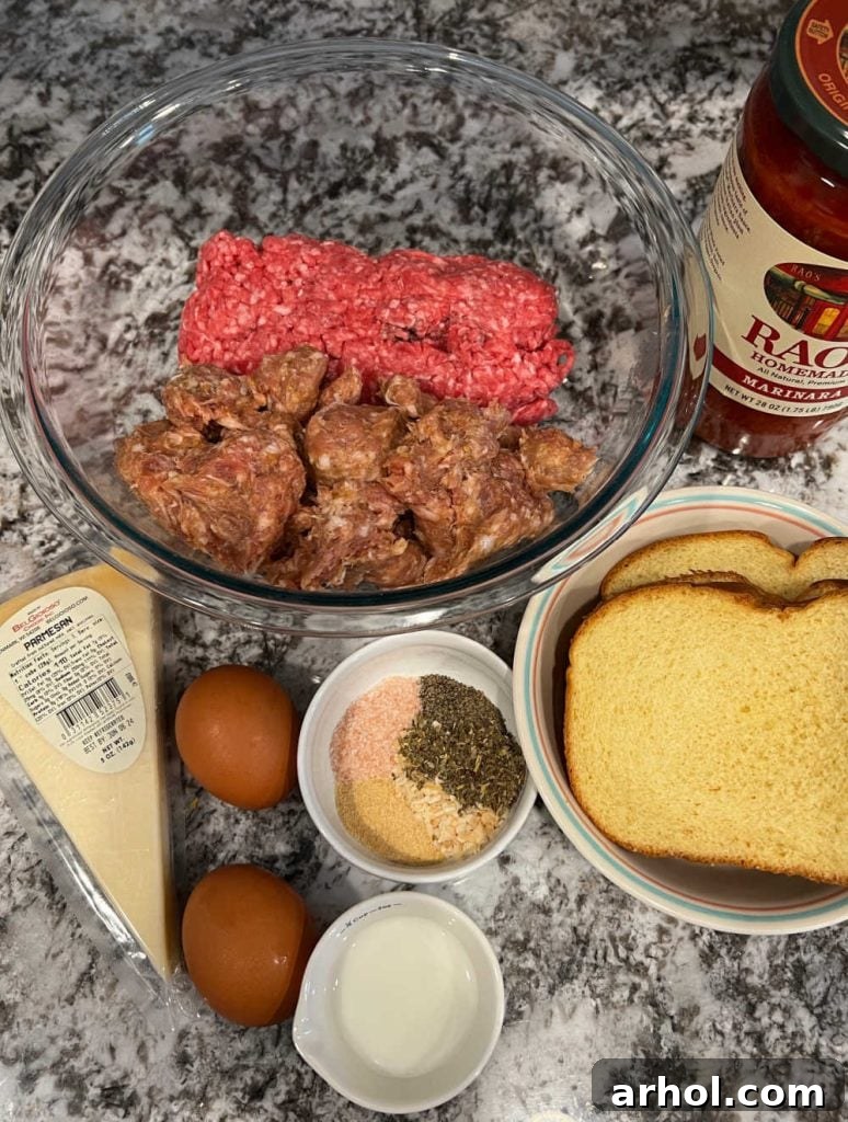 meat mixture, sauce, bread, Parmesan cheese, eggs, milk and seasonings.