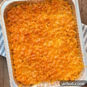 A pan of delicious, creamy smoked mac and cheese, topped with a golden, bubbly crust.