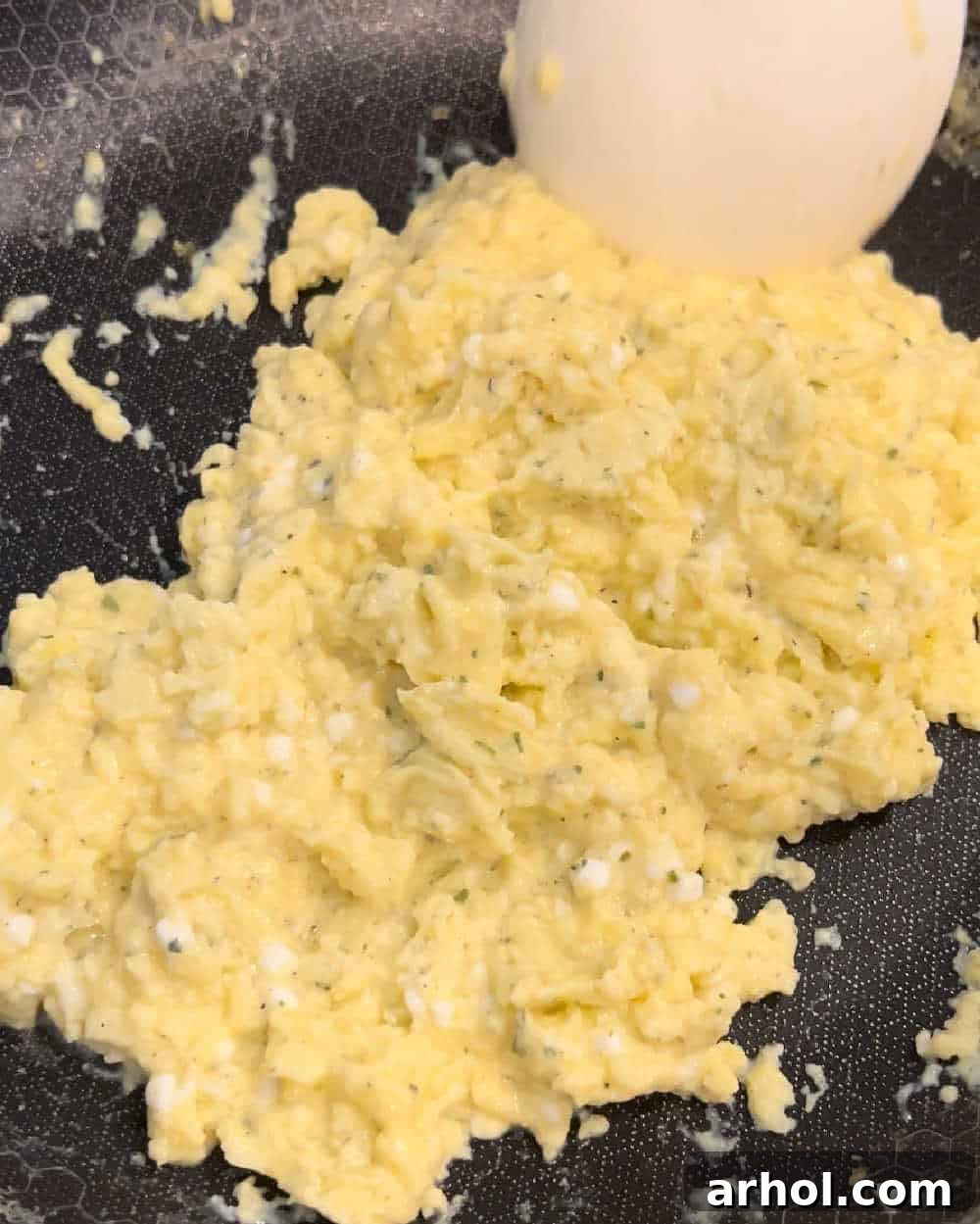 High Protein Cottage Cheese Egg Scramble 7 Perfectly cooked, creamy scrambled eggs in a skillet.