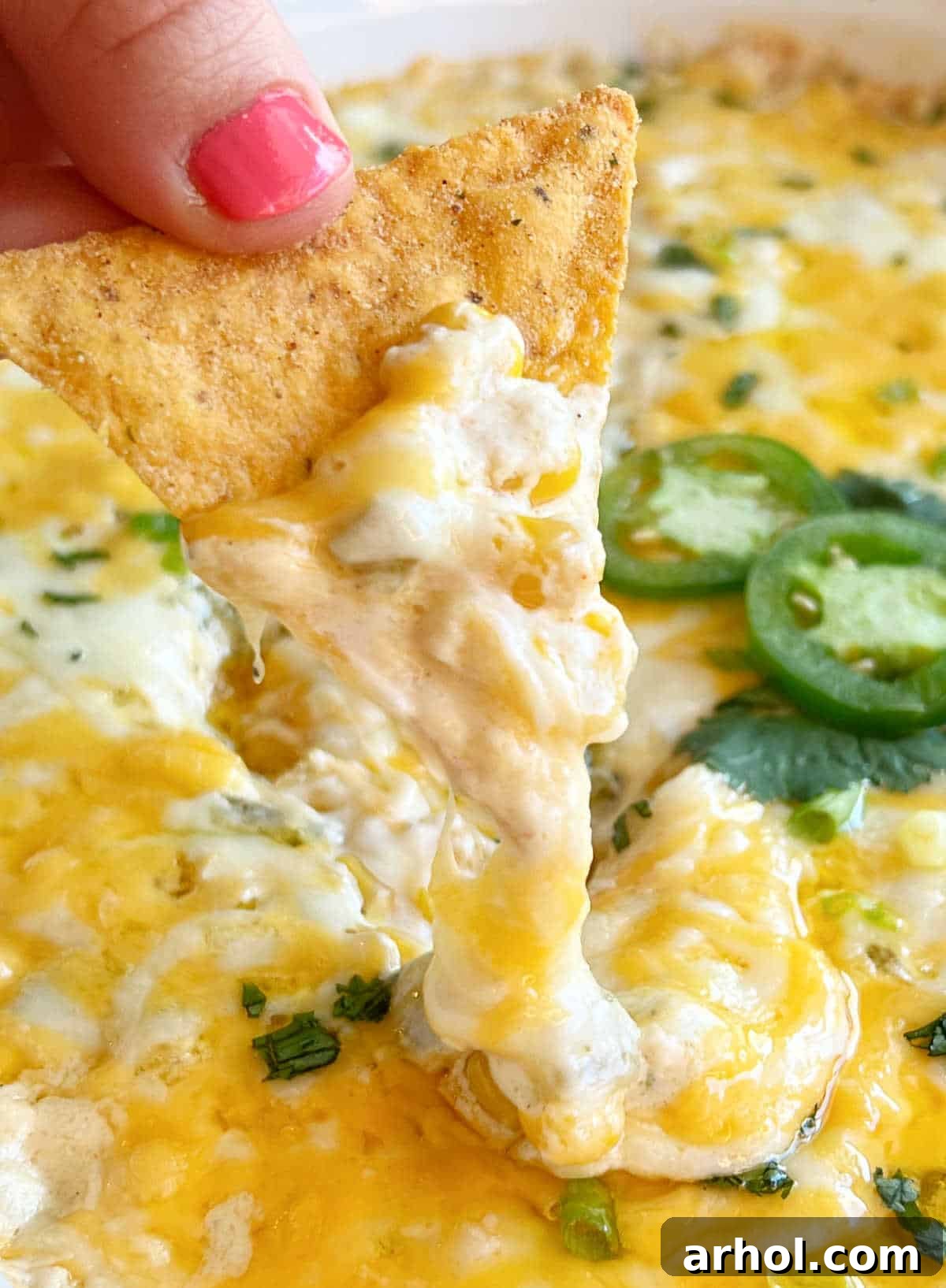 cheesy corn dip on corn chip.