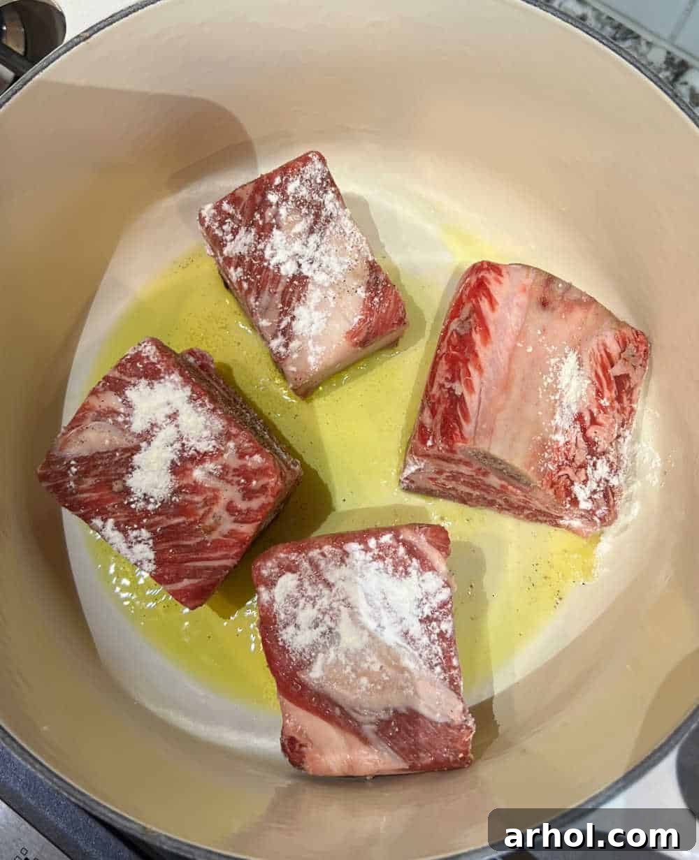 Melt-In-Your-Mouth Braised Short Ribs 4 sear beef ribs in dutch oven.
