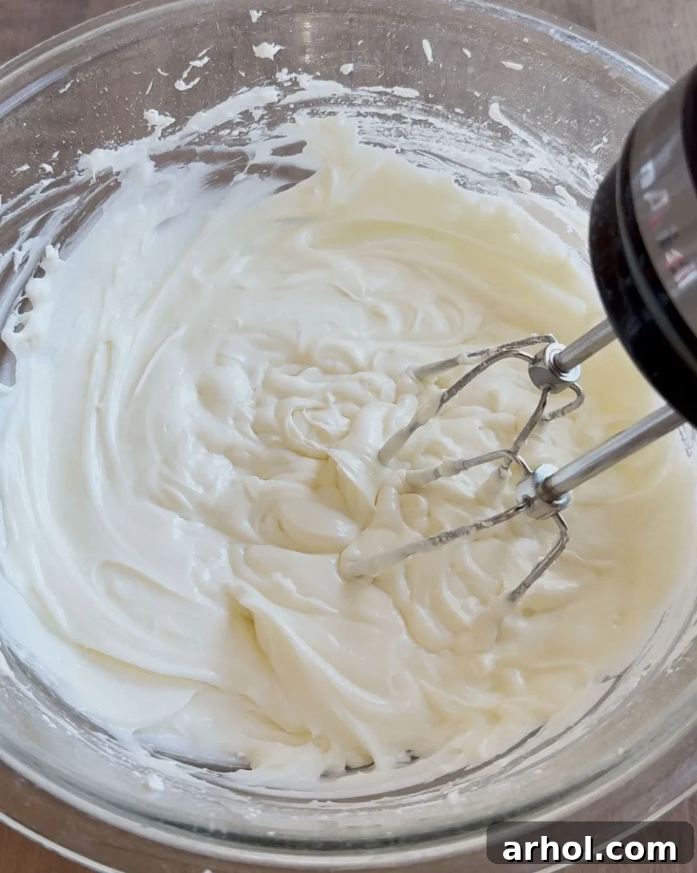 mix cream cheese layer with hand mixer.
