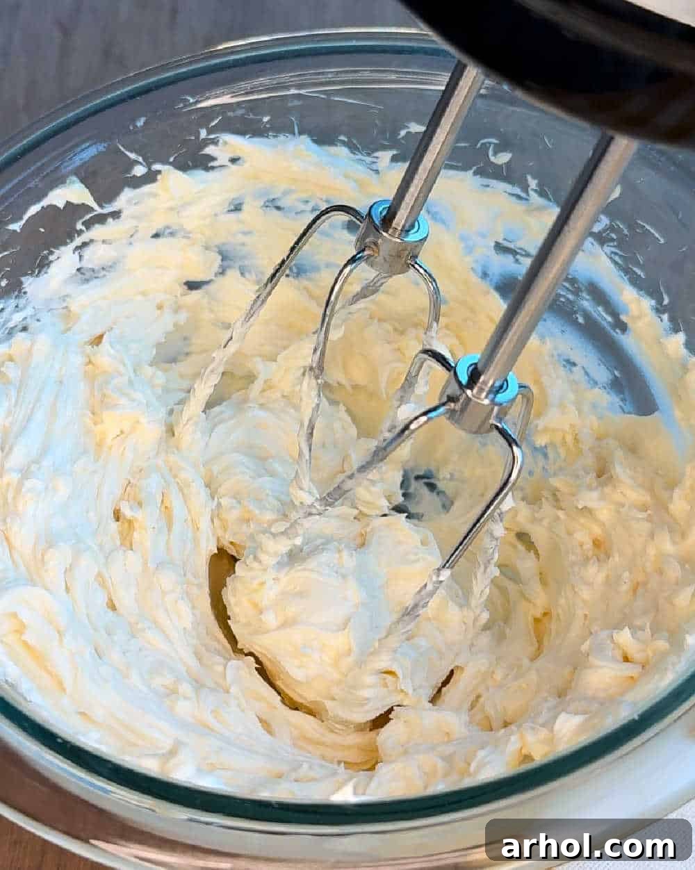 Effortless Two-Ingredient Honey Butter 6 mix ingredients with mixer.