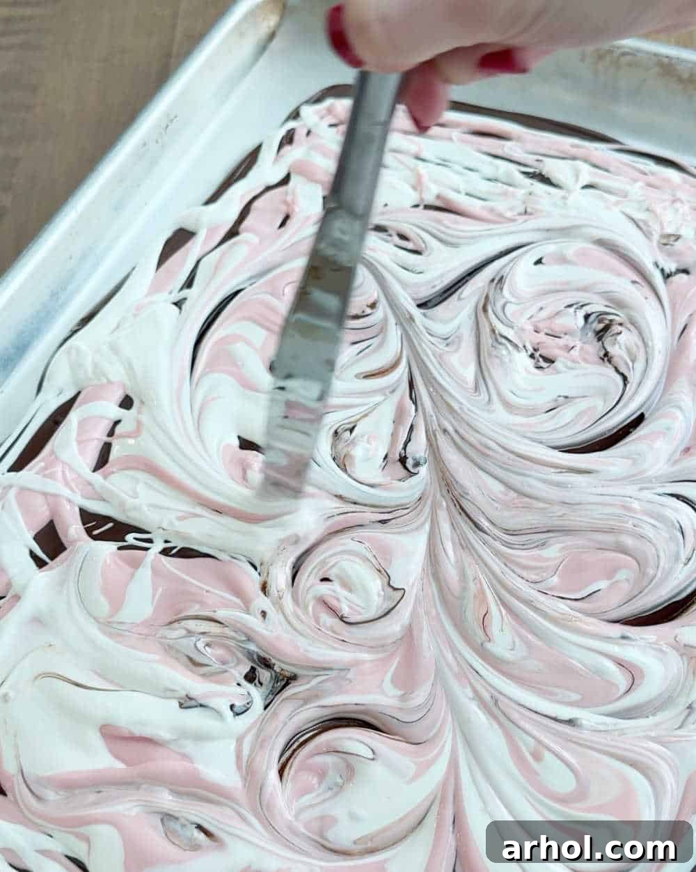 swirl layers with knife.