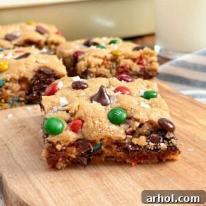 monster cookie bars with flaked salt and m&m candies.