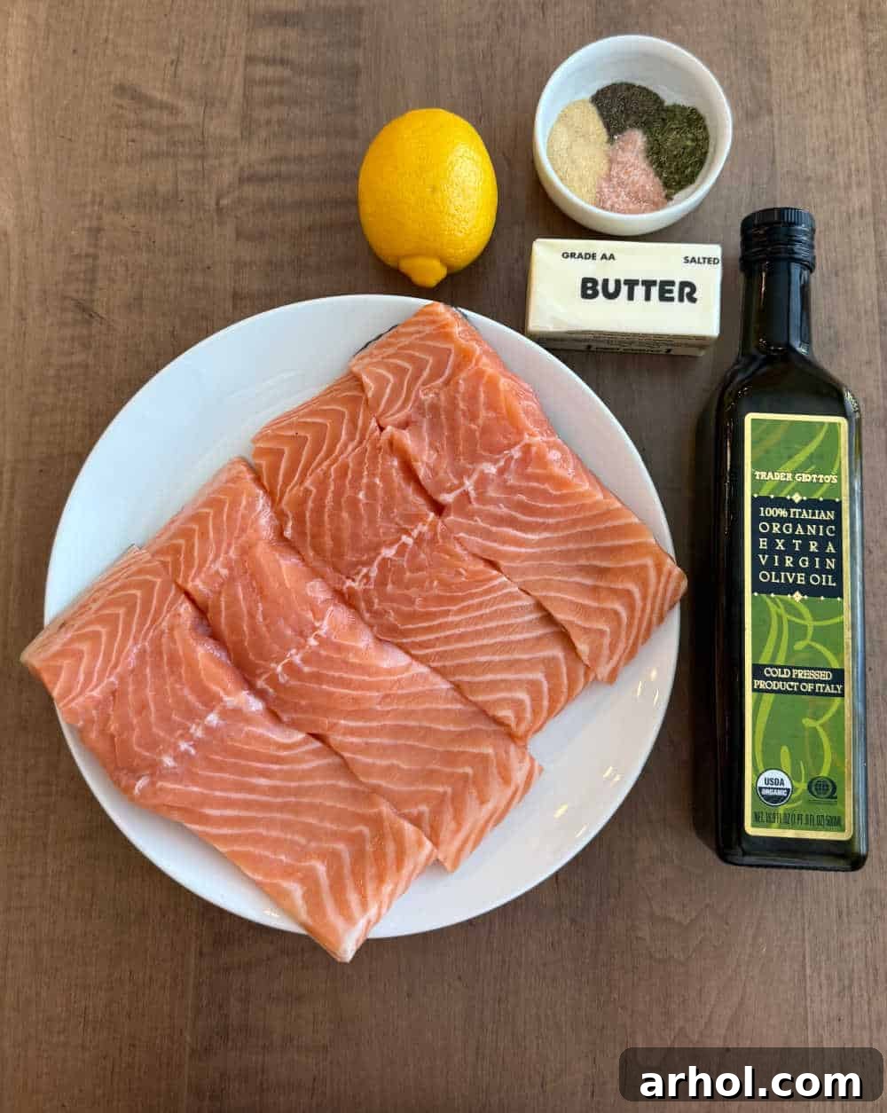 salmon filets, lemon, butter, olive oil, spices.