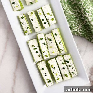 stuffed celery with cream cheese topped with chives.