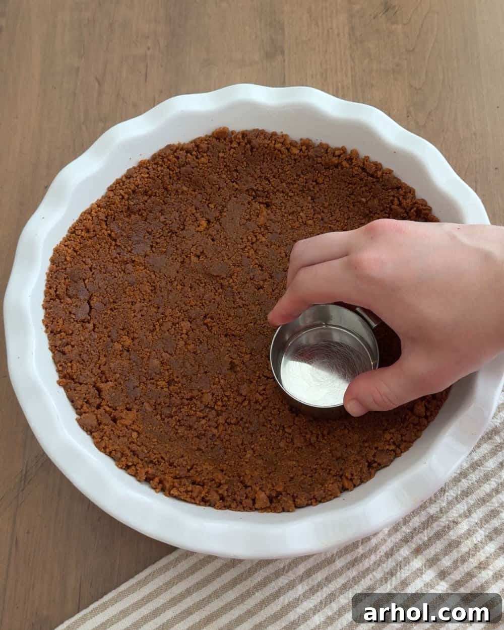 Irresistible No-Bake Cookie Butter Pie 4 press crust in pie dish.