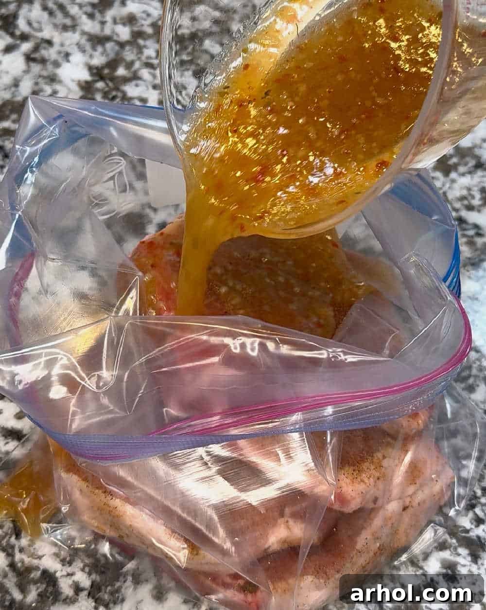 Pour Italian salad dressing over pork chops in freezer bag.