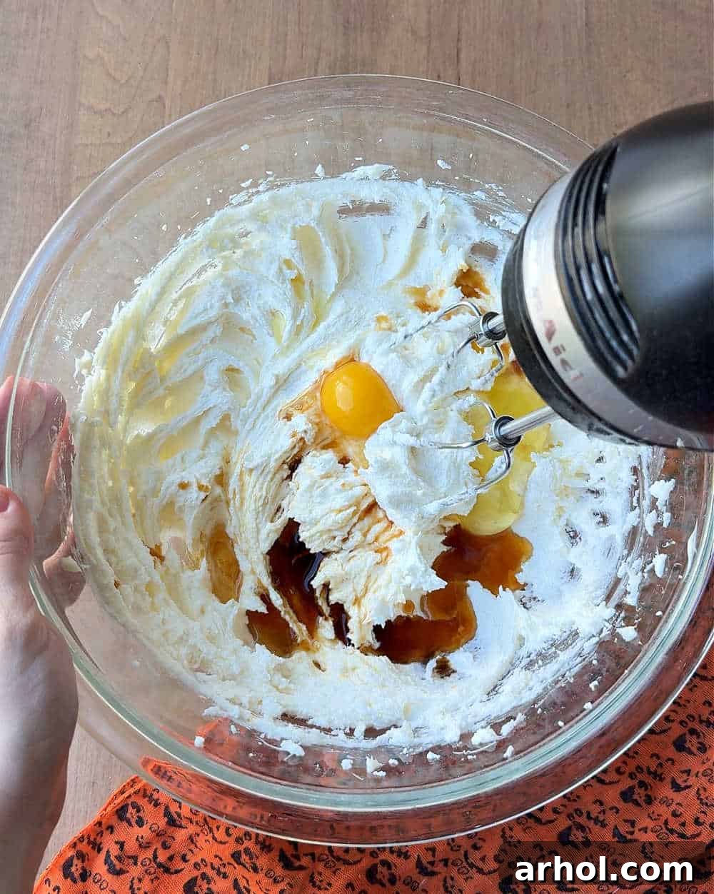 mixing wet ingredients in bowl.