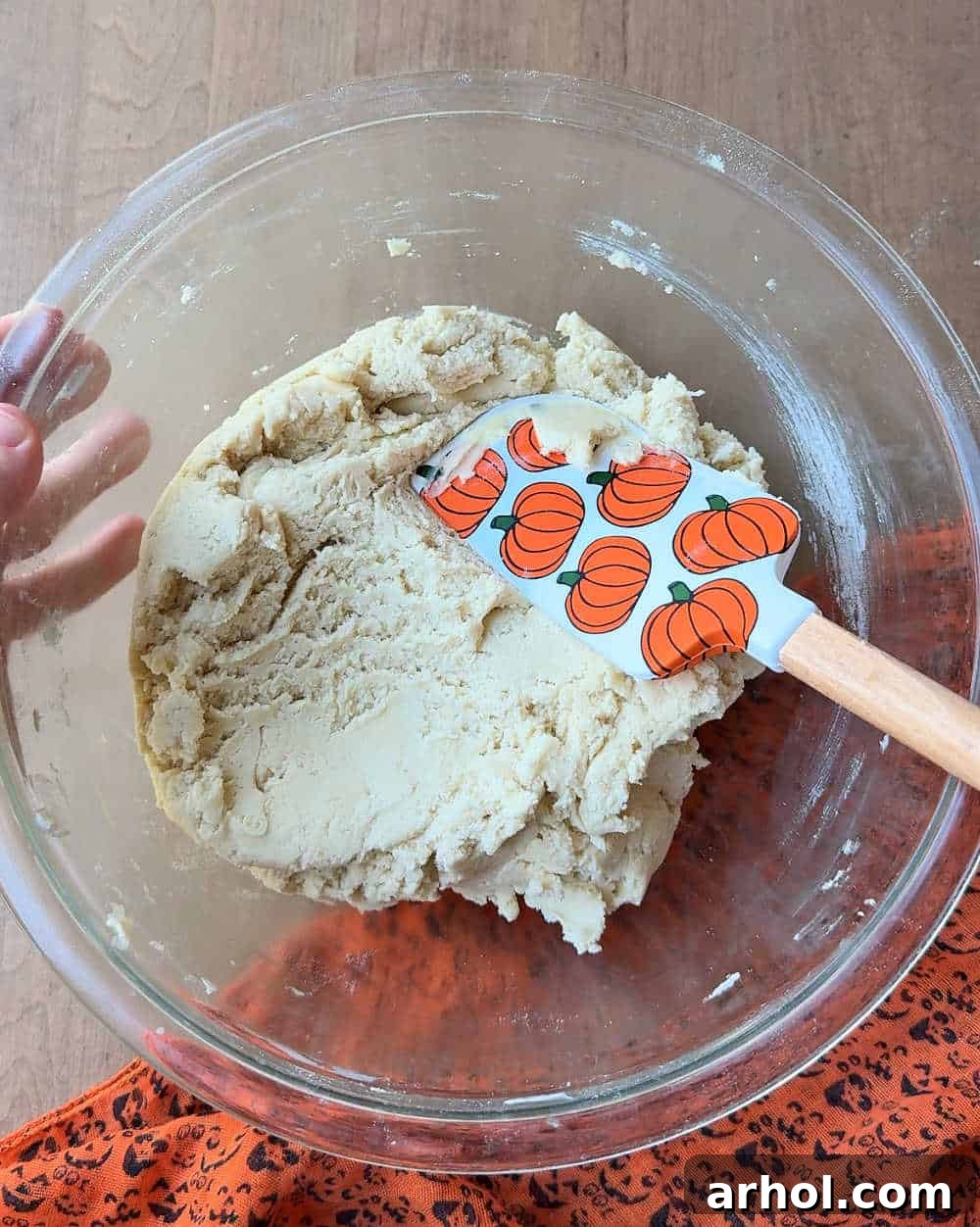 pumpkin spatula on cookie dough.