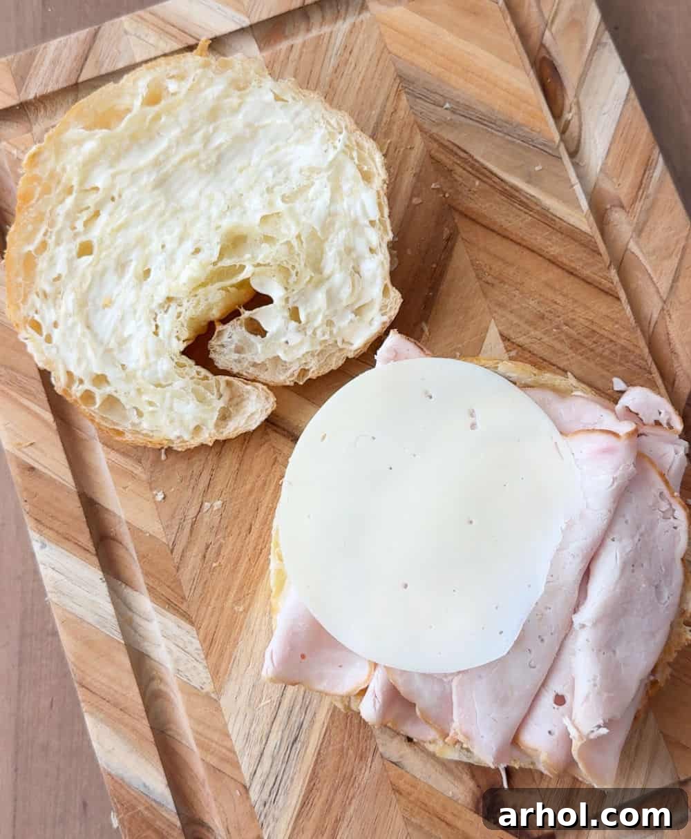 adding turkey and cheese.