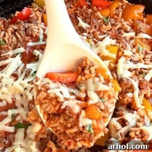 unstuffed peppers with cheese on a serving spoon